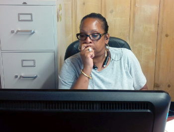 A Green Clean A Scene, Inc. team member at the office